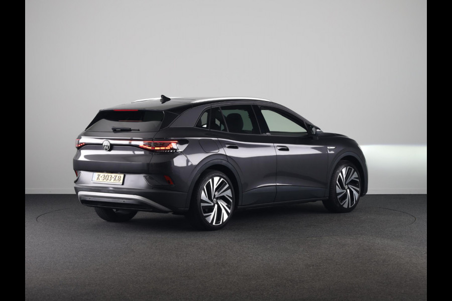 Volkswagen ID.4 Max 77 kWh | Panoramadak | SoH 88,96 % | Navigatie | 360 camera | Apple Carplay/Android Auto | Elek verstelbare stoel(en) | 21" Velgen | Elek Achterklep | Dode hoek Sensoren |