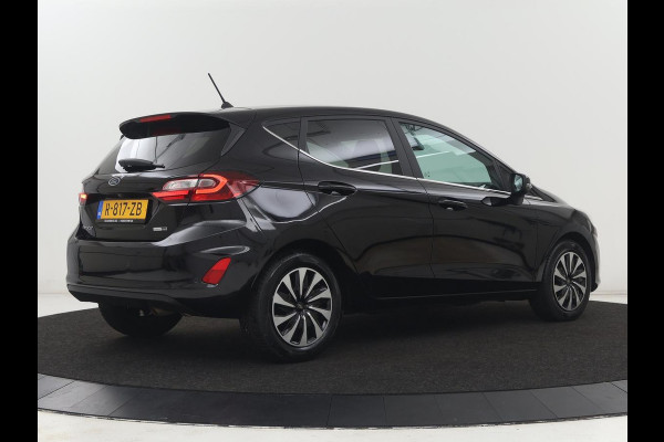 Ford Fiesta 1.0 EcoBoost Hybrid Titanium X | Carplay | Camera | Climate control | Keyless | Full LED | Cruise control | Bluetooth | Park Assist | Getint glas | Origineel NL