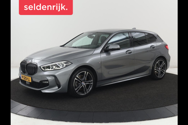 BMW 1-serie 118i M Sport | Carplay | Sportstoelen | Camera | Half leder | Navigatie | Live Cockpit | Park Assist | Full LED | Climate control | Sfeerverlichting | Cruise control | Bluetooth