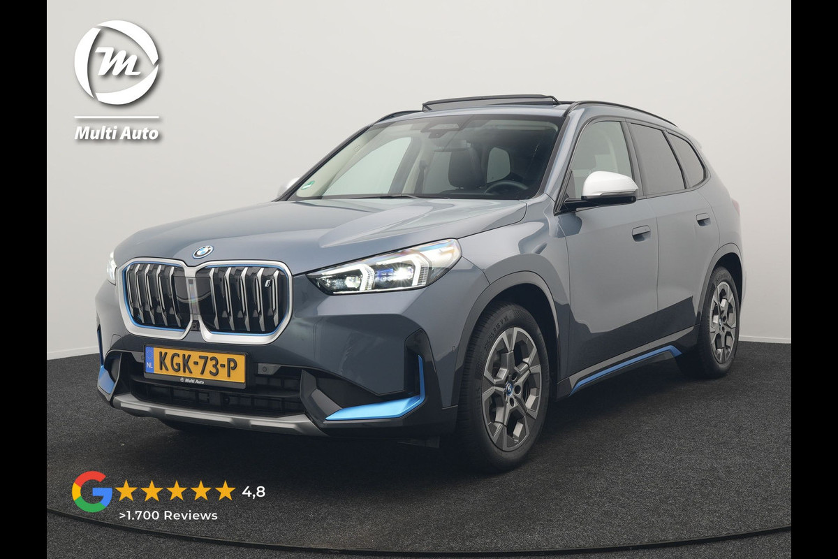 BMW iX1 xDrive30 Launch Edition 313pk 67 kWh Dealer O.H 96.5% SOH | Panodak | Adaptive Cruise | 360 Camera | Lederen Comfortzetels Massage & Memory | Head Up | Harman Kardon | Keyless |