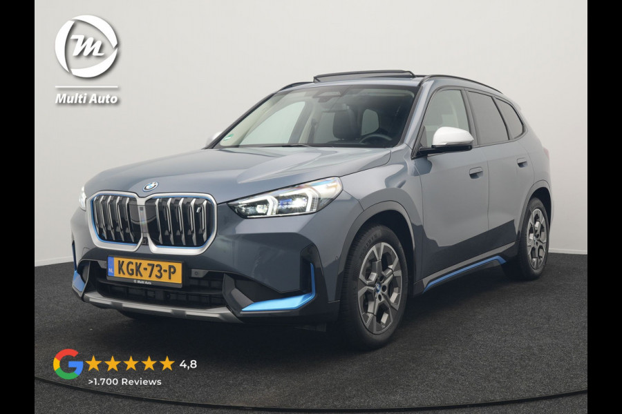 BMW iX1 xDrive30 Launch Edition 313pk 67 kWh Dealer O.H 96.5% SOH | Panodak | Adaptive Cruise | 360 Camera | Lederen Comfortzetels Massage & Memory | Head Up | Harman Kardon | Keyless |