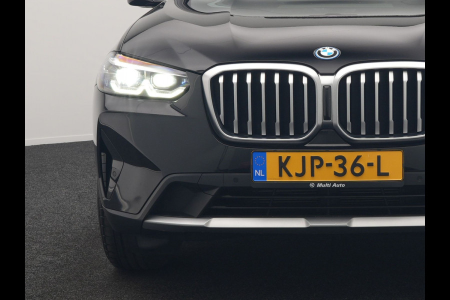 BMW X3 xDrive30e X Line FACELIFT PHEV 293pk Dealer O.H. | Trekhaak Af Fabriek | Panodak | Camera | Sfeerverlichting | Lederen Sportstoelen Verwarmd | Apple Carplay | Navigatie | DAB | Virtual | Cruise Control | Plug In Hybrid |