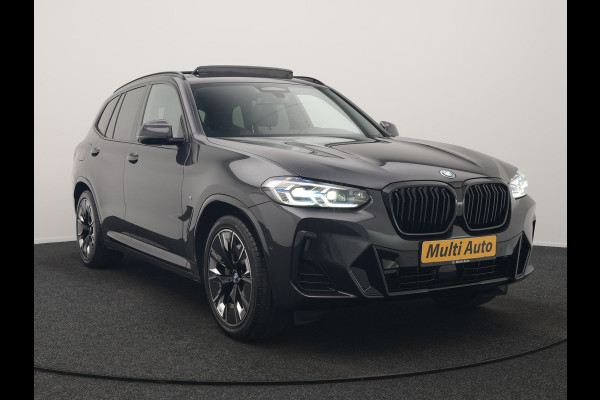 BMW iX3 M Sport 80 kWh 286pk Dealer O.H. | Trekhaak Af Fabriek | Panodak | Head Up | Adaptive Cruise | 360 Camera | Harman / Kardon | Lederen Sportstoelen Memory & Verwarmd | Laser LED | Stuur Verwarmd | Keyless | Blis | Sfeerverlichting | 20"L.M |