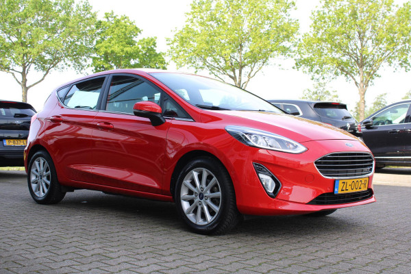 Ford Fiesta 1.0 EcoBoost Titanium | Stoel + Stuurverwarming | Climate Control | Camera | Navigatie | Parkeersensoren | Lichtmetalen Velgen | Dodehoeksensoren