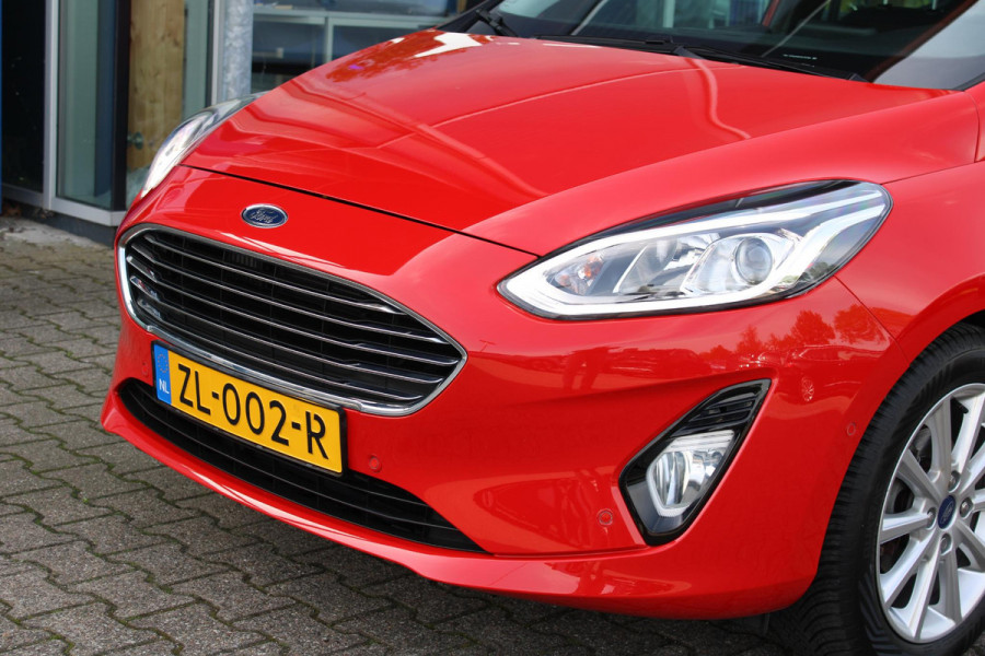 Ford Fiesta 1.0 EcoBoost Titanium | Stoel + Stuurverwarming | Climate Control | Camera | Navigatie | Parkeersensoren | Lichtmetalen Velgen | Dodehoeksensoren