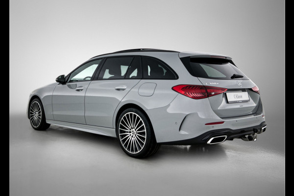 Mercedes-Benz C-Klasse Estate 300 e Business Solution AMG | Comfortpakket Plus | Parkeerpakket met 360°-camera | Nightpakket | Middenconsole metaalstructuur | Trekhaak | Panoramaschuifdak | 19" multispaaks lichtmetalen AMG-velgen | GUARD 360° Plus |