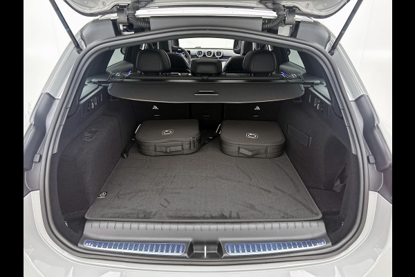 Mercedes-Benz C-Klasse Estate 300 e Business Solution AMG | Comfortpakket Plus | Parkeerpakket met 360°-camera | Nightpakket | Middenconsole metaalstructuur | Trekhaak | Panoramaschuifdak | 19" multispaaks lichtmetalen AMG-velgen | GUARD 360° Plus |
