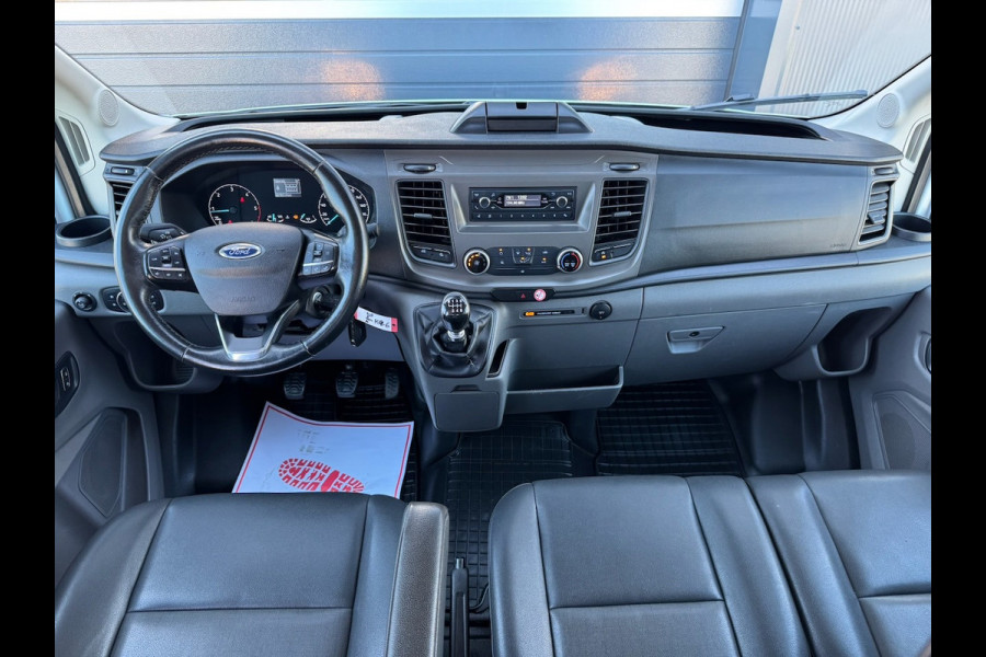 Ford Transit 310 2.0 TDCI 130pk L2H1 DC Trend | Open Laadbak | Trekhaak 2550KG | Airco | Kunstleder | Bluetooth | 7-persoons