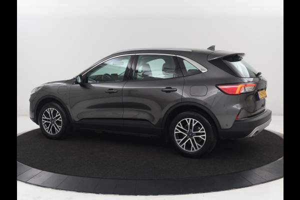 Ford Kuga 2.5 PHEV Titanium | SOH 85,6% | Trekhaak | Stoelverwarming | Camera | Adaptive cruise | Side Assist | Navigatie | Achterbankverwarming | Keyless | Carplay | Plug In