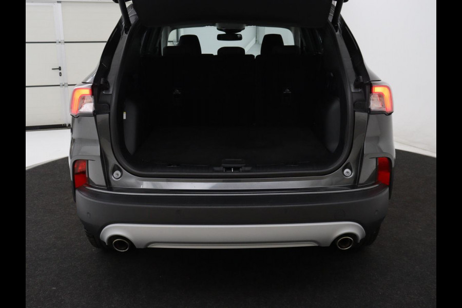 Ford Kuga 2.5 PHEV Titanium | SOH 85,6% | Trekhaak | Stoelverwarming | Camera | Adaptive cruise | Side Assist | Navigatie | Achterbankverwarming | Keyless | Carplay | Plug In