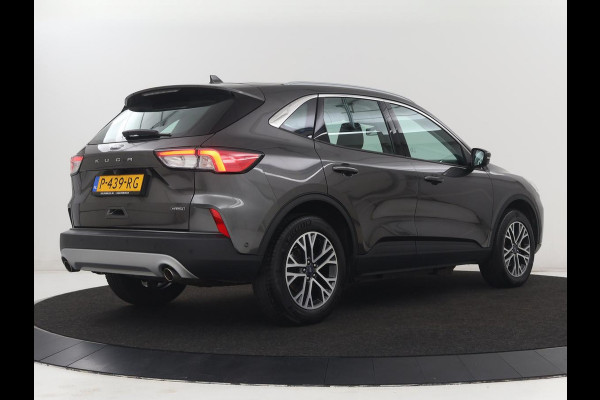 Ford Kuga 2.5 PHEV Titanium | SOH 85,6% | Trekhaak | Stoelverwarming | Camera | Adaptive cruise | Side Assist | Navigatie | Achterbankverwarming | Keyless | Carplay | Plug In