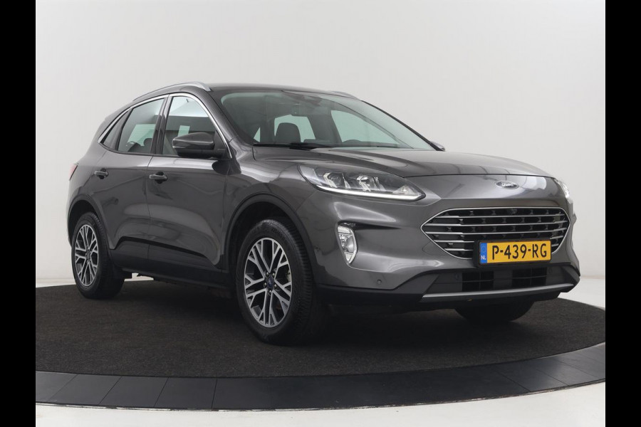 Ford Kuga 2.5 PHEV Titanium | SOH 85,6% | Trekhaak | Stoelverwarming | Camera | Adaptive cruise | Side Assist | Navigatie | Achterbankverwarming | Keyless | Carplay | Plug In