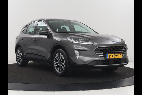 Ford Kuga 2.5 PHEV Titanium | SOH 85,6% | Trekhaak | Stoelverwarming | Camera | Adaptive cruise | Side Assist | Navigatie | Achterbankverwarming | Keyless | Carplay | Plug In
