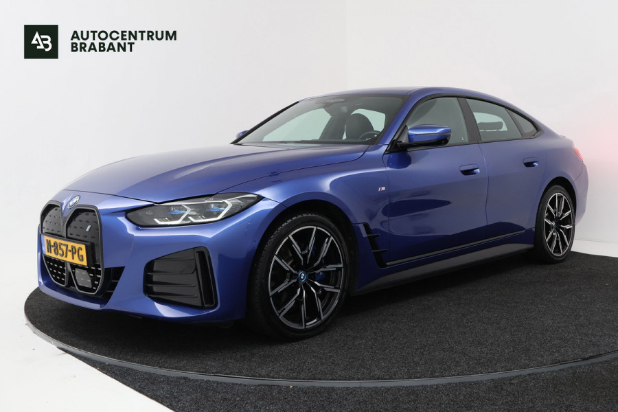 BMW i4 EDrive40 High Executive 84 kWh M-pakket( 1e Eig, Dealer OndH, Panorama, 360 Camera, Addpt Cruise, StoelV, Etc)
