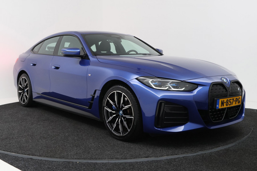 BMW i4 EDrive40 High Executive 84 kWh M-pakket( 1e Eig, Dealer OndH, Panorama, 360 Camera, Addpt Cruise, StoelV, Etc)