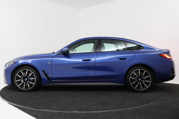 BMW i4 EDrive40 High Executive 84 kWh M-pakket( 1e Eig, Dealer OndH, Panorama, 360 Camera, Addpt Cruise, StoelV, Etc)