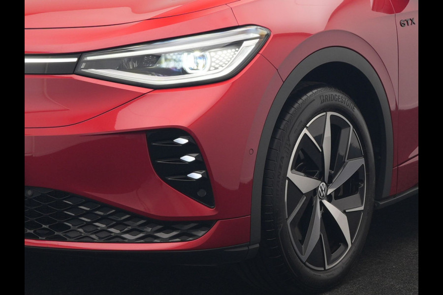 Volkswagen ID.4 GTX 4Motion 77 kWh 299pk Dealer O.H. | Adaptive Cruise | Head Up | 360 Camera | Alcantara Sportstoelen Massage & Memory | IQ Light | Sfeerverlichting | Keyless | Blis | Apple Carplay | Stuur Verwarmd | Navigatie | DAB |
