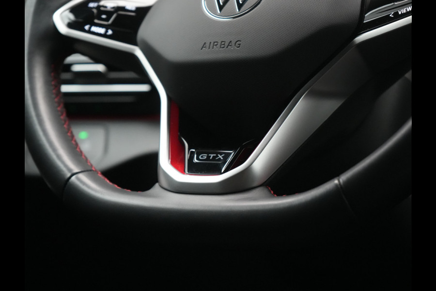 Volkswagen ID.4 GTX 4Motion 77 kWh 299pk Dealer O.H. | Adaptive Cruise | Head Up | 360 Camera | Alcantara Sportstoelen Massage & Memory | IQ Light | Sfeerverlichting | Keyless | Blis | Apple Carplay | Stuur Verwarmd | Navigatie | DAB |