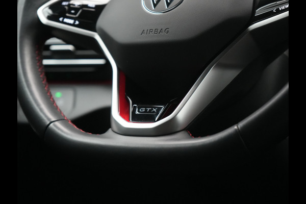 Volkswagen ID.4 GTX 4Motion 77 kWh 299pk Dealer O.H. | Adaptive Cruise | Head Up | 360 Camera | Alcantara Sportstoelen Massage & Memory | IQ Light | Sfeerverlichting | Keyless | Blis | Apple Carplay | Stuur Verwarmd | Navigatie | DAB |