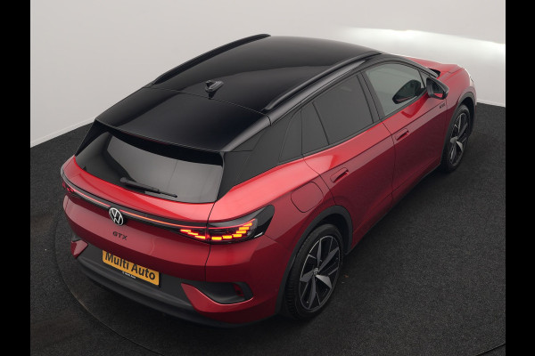 Volkswagen ID.4 GTX 4Motion 77 kWh 299pk Dealer O.H. | Adaptive Cruise | Head Up | 360 Camera | Alcantara Sportstoelen Massage & Memory | IQ Light | Sfeerverlichting | Keyless | Blis | Apple Carplay | Stuur Verwarmd | Navigatie | DAB |