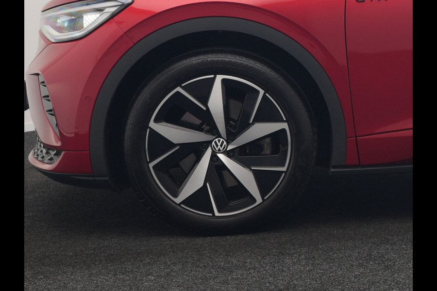 Volkswagen ID.4 GTX 4Motion 77 kWh 299pk Dealer O.H. | Adaptive Cruise | Head Up | 360 Camera | Alcantara Sportstoelen Massage & Memory | IQ Light | Sfeerverlichting | Keyless | Blis | Apple Carplay | Stuur Verwarmd | Navigatie | DAB |