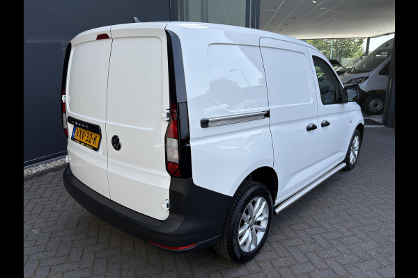Volkswagen Caddy Cargo 2.0 TDI Airco - Apple carplay - Navigatie - Parkeersensor achter - Zijschuifdeur links/ rechts - Tussenschot volledig - Cruise control - Mistlampen - Bluetooth - Stuur multifunctioneel - Elektrische ramen - Start/stop systeem