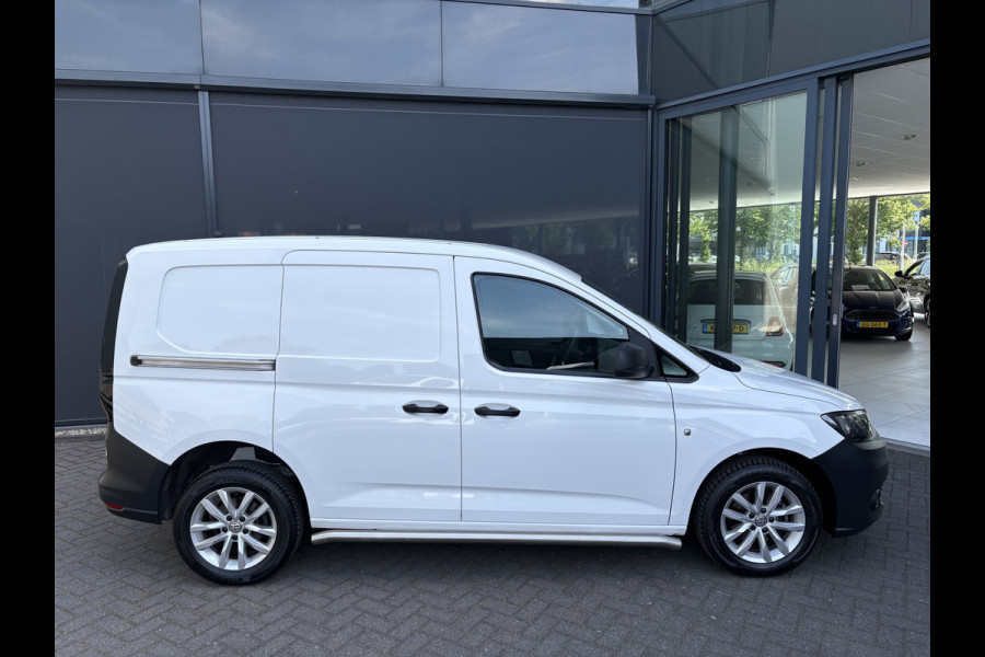 Volkswagen Caddy Cargo 2.0 TDI Airco - Apple carplay - Navigatie - Parkeersensor achter - Zijschuifdeur links/ rechts - Tussenschot volledig - Cruise control - Mistlampen - Bluetooth - Stuur multifunctioneel - Elektrische ramen - Start/stop systeem