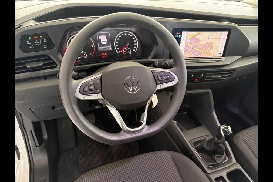 Volkswagen Caddy Cargo 2.0 TDI Airco - Apple carplay - Navigatie - Parkeersensor achter - Zijschuifdeur links/ rechts - Tussenschot volledig - Cruise control - Mistlampen - Bluetooth - Stuur multifunctioneel - Elektrische ramen - Start/stop systeem