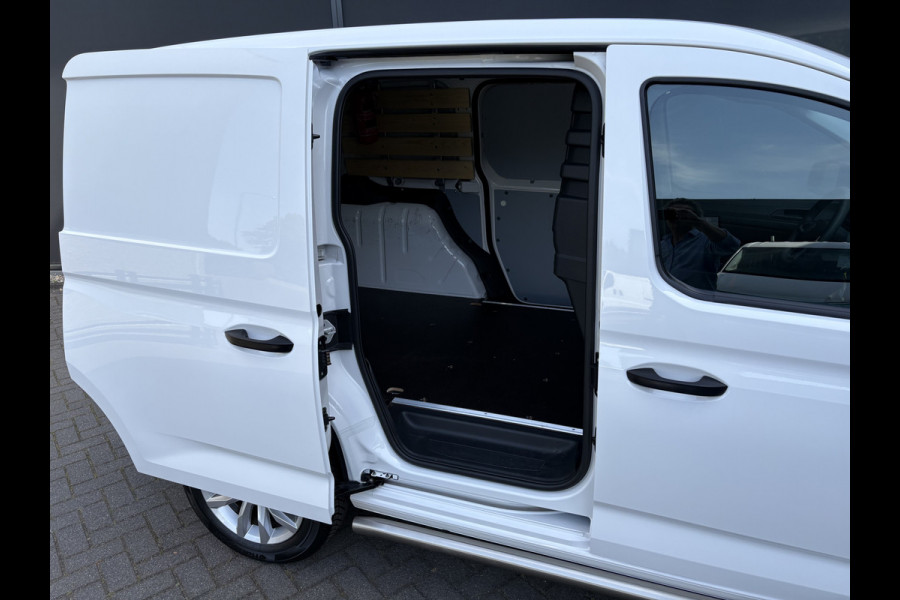 Volkswagen Caddy Cargo 2.0 TDI Airco - Apple carplay - Navigatie - Parkeersensor achter - Zijschuifdeur links/ rechts - Tussenschot volledig - Cruise control - Mistlampen - Bluetooth - Stuur multifunctioneel - Elektrische ramen - Start/stop systeem