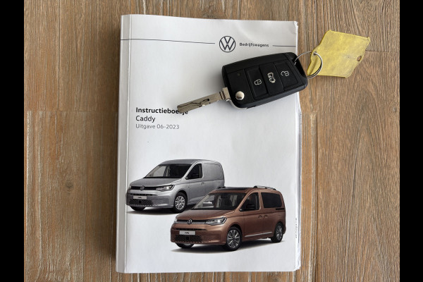 Volkswagen Caddy Cargo 2.0 TDI Airco - Apple carplay - Navigatie - Parkeersensor achter - Zijschuifdeur links/ rechts - Tussenschot volledig - Cruise control - Mistlampen - Bluetooth - Stuur multifunctioneel - Elektrische ramen - Start/stop systeem