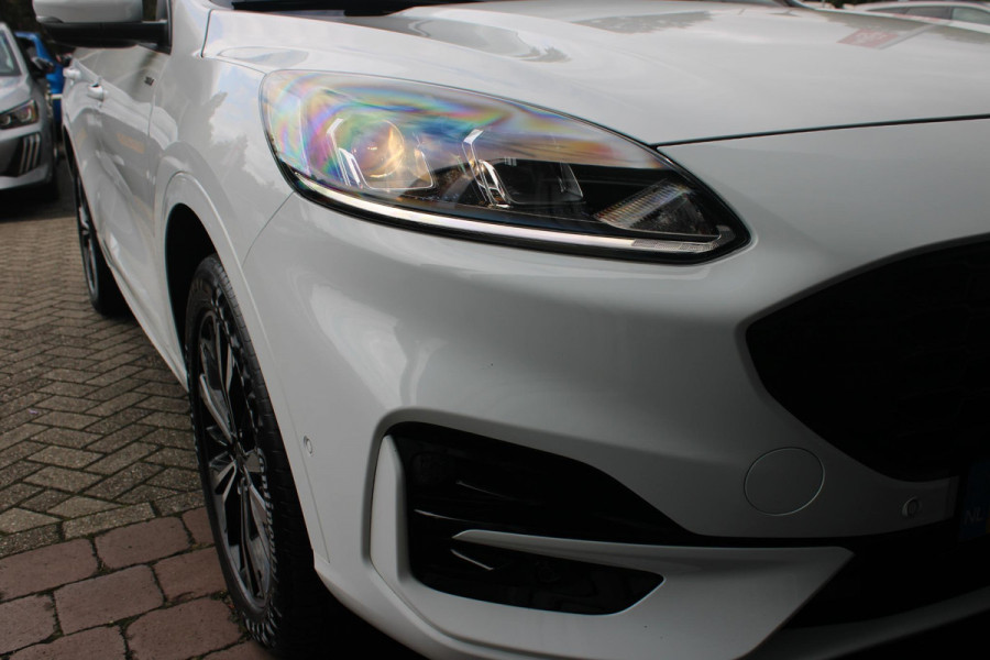 Ford Kuga 2.5 PHEV 225PK ST-LINE X | ELEKTRISCH WEGKLAPBARE TREKHAAK | NAVIGATIE | WINTER PACK: VOORRUIT/STUUR/STOEL VERWARMING | ACHTERBANK VERWARMING | DODEHOEKDETECTIE | CAMERA VOOR + ACHTER | KEYLESS ENTRY/START | RODE REMKLAUWEN | ADAPTIVE CRUISE CONTROL | DAB+ RADIO | APPLE CARPLAY/ANDROID AUTO | 19" LICHTMETALEN VELGEN | PARKEERSENSOREN VOOR + ACHTER | AUTOMATISCH INPARKEREN | ELEKTRISCH BEDIENBARE ACHTERKLEP |