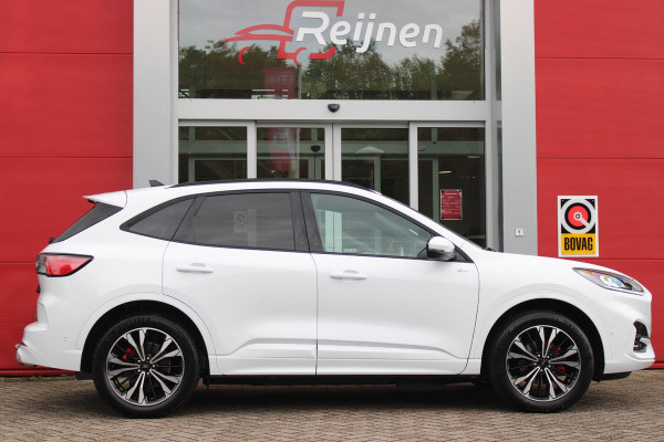 Ford Kuga 2.5 PHEV 225PK ST-LINE X | ELEKTRISCH WEGKLAPBARE TREKHAAK | NAVIGATIE | WINTER PACK: VOORRUIT/STUUR/STOEL VERWARMING | ACHTERBANK VERWARMING | DODEHOEKDETECTIE | CAMERA VOOR + ACHTER | KEYLESS ENTRY/START | RODE REMKLAUWEN | ADAPTIVE CRUISE CONTROL | DAB+ RADIO | APPLE CARPLAY/ANDROID AUTO | 19" LICHTMETALEN VELGEN | PARKEERSENSOREN VOOR + ACHTER | AUTOMATISCH INPARKEREN | ELEKTRISCH BEDIENBARE ACHTERKLEP |