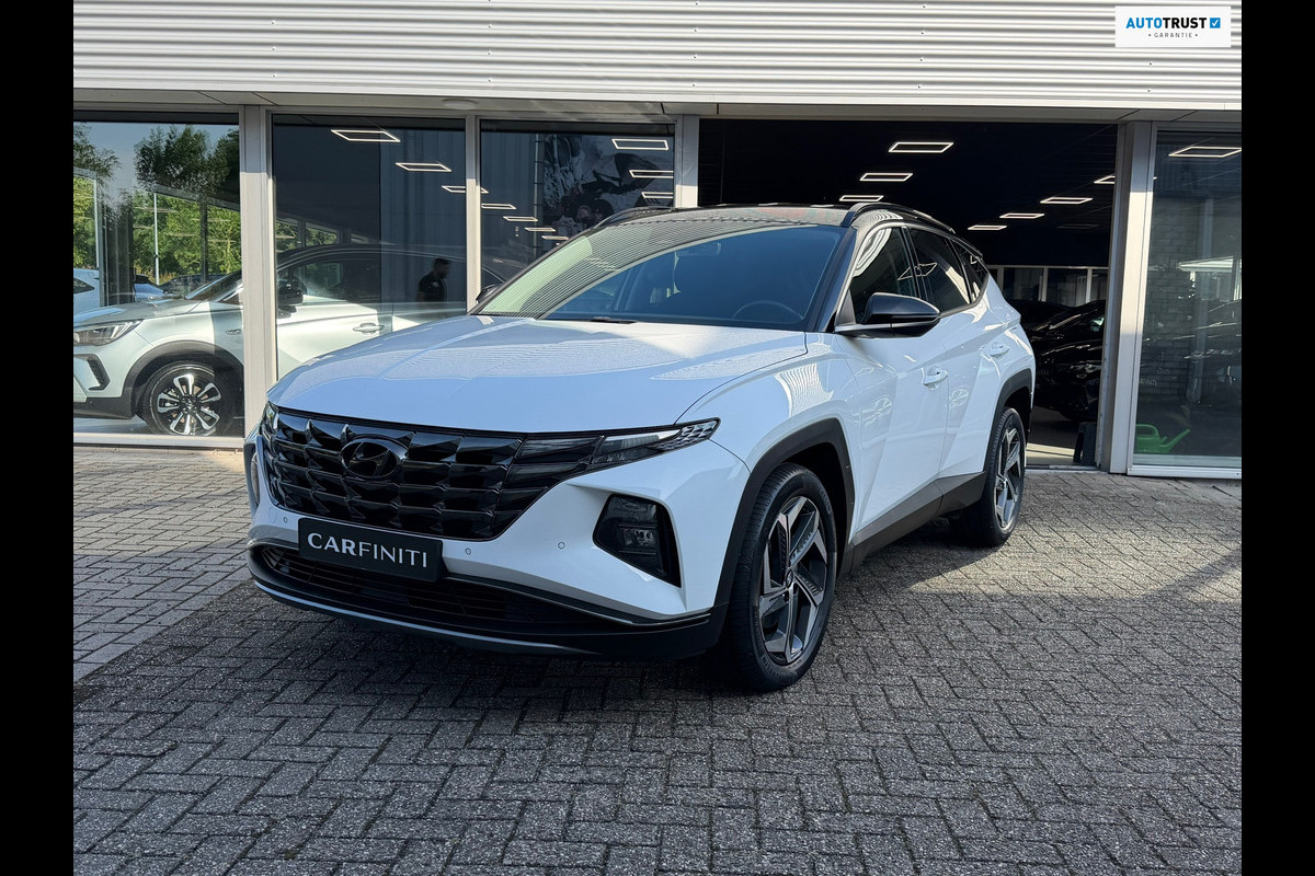 Hyundai Tucson 1.6 T-GDI PHEV 265 Pk Comfort 4WD | Bicolor | Navigatie | Camera | Clima | Cruise | Keyless | 19".