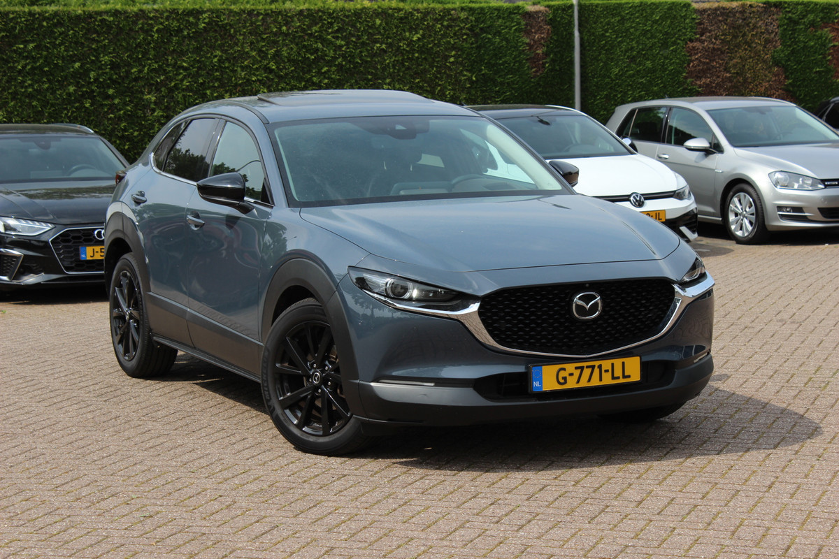 Mazda CX-30 2.0 e-SkyActiv-X M Hybrid Luxury / NL Auto! / Full option! / Trekhaak / Schuifdak / 360Camera / Head-up / Leder / Keyless / 18'' / CarPlay / Bose / Stuur+Stoelverwarming / Dodehoek / DAB / ACC