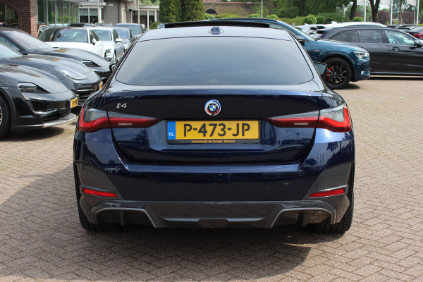 BMW i4 eDrive40 High Exe. M Sportpakket 84 kWh / SOH 91,4% / Trekhaak / Schuifdak / 360Camera / Head-up / Leder / Harman Kardon / Keyless / 19'' / Sfeerverlichting / CarPlay / Stoelventilatie+Verwarming / DAB / ACC