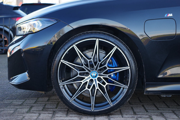 BMW 3 Serie Touring 330e High Executive M-Sport 293 PK PHEV, Panoramadak, M-Kuipstoelen, Adap. Cruise Control
