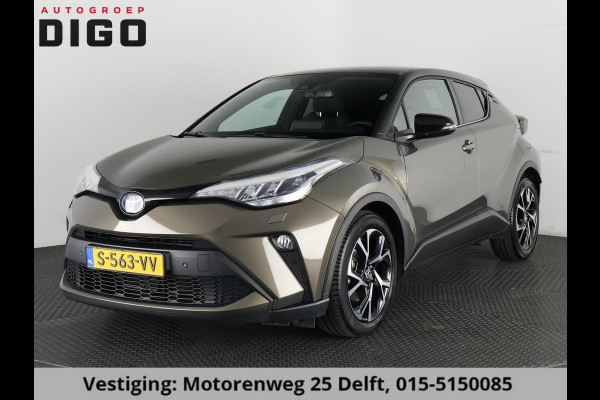 Toyota C-HR 1.8 HYBRID BI-TONE LUXERY LINE GARANTIE 5-2032 TREKHAAK. 4 SEIZOENEN BANDEN.NAVIGATIE. STUUR EN STOELVERWARMING. HALF LEDER