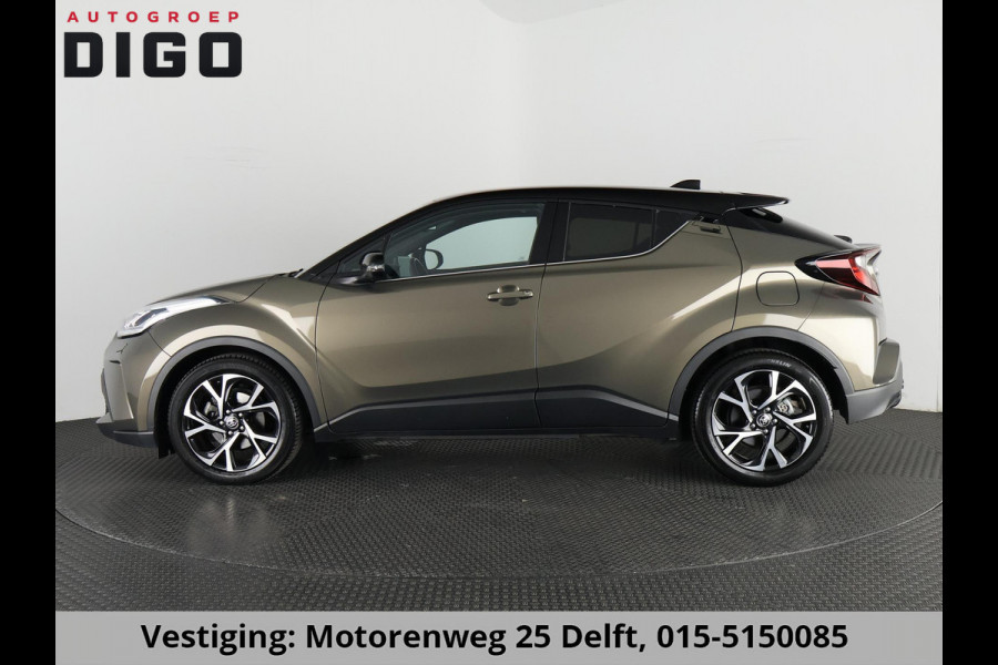 Toyota C-HR 1.8 HYBRID BI-TONE LUXERY LINE GARANTIE 5-2032 TREKHAAK. 4 SEIZOENEN BANDEN.NAVIGATIE. STUUR EN STOELVERWARMING. HALF LEDER