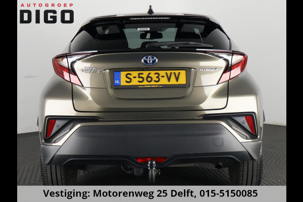 Toyota C-HR 1.8 HYBRID BI-TONE LUXERY LINE GARANTIE 5-2032 TREKHAAK. 4 SEIZOENEN BANDEN.NAVIGATIE. STUUR EN STOELVERWARMING. HALF LEDER