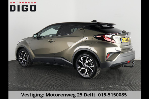 Toyota C-HR 1.8 HYBRID BI-TONE LUXERY LINE GARANTIE 5-2032 TREKHAAK. 4 SEIZOENEN BANDEN.NAVIGATIE. STUUR EN STOELVERWARMING. HALF LEDER