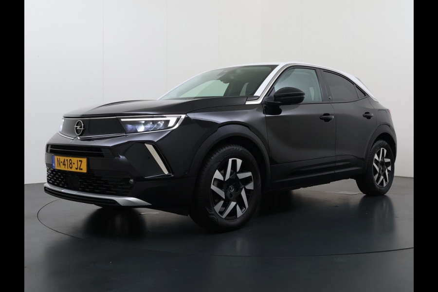 Opel Mokka Electric Level 2 50kWh Warmtepomp Trekhaak Adap.Cruise Navi 360°Camera Ecc Apple Carplay Android Auto Pdc SOH 85% Keyless Lmv Led Privacy Glas Isofix Dealeronderhouden Origineel Nederlandse Auto