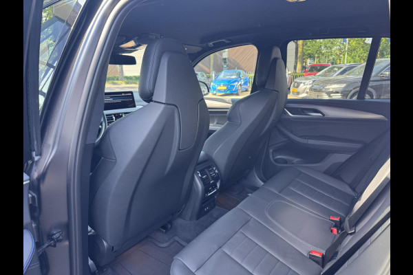 BMW X3 xDrive30e HIGH EXECUTIVE M SPORT | M-TECHNIC SPORTSTOELEN + MEMORY + LEER | ELEKTR. TREKHAAK | 360 CAMERA | HEAD-UP DISPLAY | 20 INCH | AMBI LIGHT | AERODYNAMICA-PAKKET | STOEL- + STUURVERWARMING | DEALER ONDERHOUDEN | RIJKLAAR |