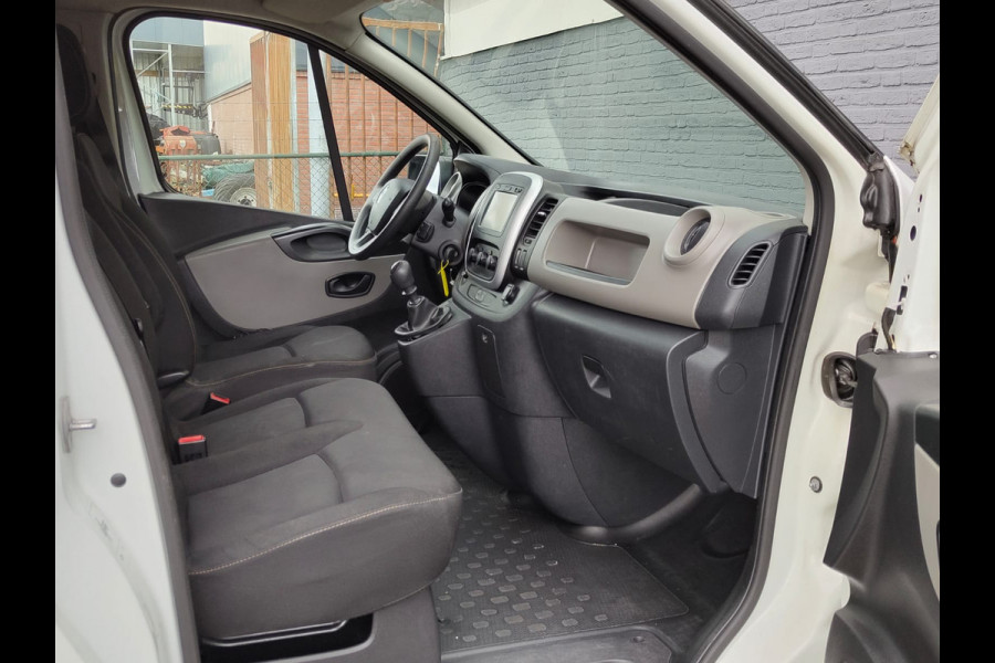 Renault Trafic 1.6 dCi 126PK T29 L2H1 3-Persoons Euro 6 Trekhaak Airco Navi Cruise Control Bluetooth Pdc Comfort Energy Betonplex vloer Wandbetimmering Schuifdeur Achterdeuren Origineel Nederlandse Auto