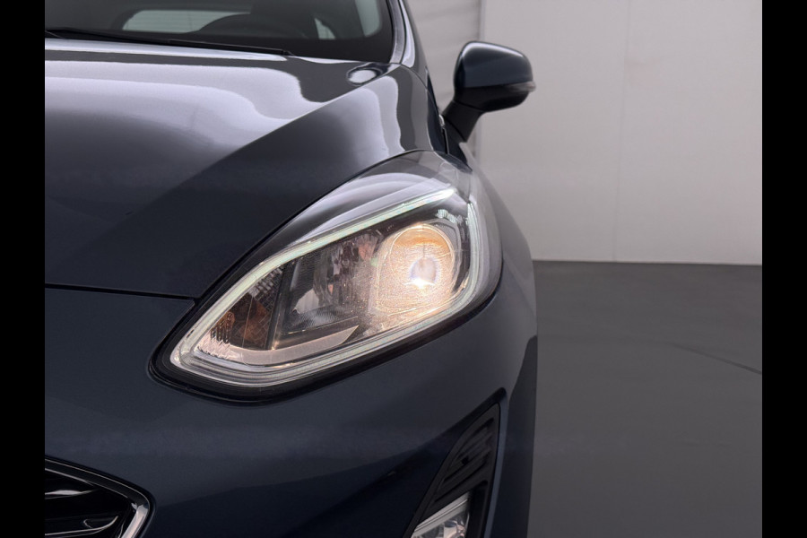 Ford Fiesta 1.0T 126PK Titanium Apple Carplay Android Navi LM Airco Stoelverwarming Apps Voorruitverwarming Wifi Mistlampen Chroompack TCS Led Lmv Lane Assist Isofix TCS EAB Hill-Start-Assist Ford-Pass-Connect LED