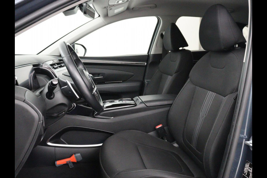 Hyundai Tucson 1.6 T-GDI HEV Comfort | Trekhaak | Stoelverwarming | Adaptive cruise | Carplay | Camera | Navigatie | Keyless | Full LED | 17'' | Parkeerhulp | Climate control | Digital Cockpit