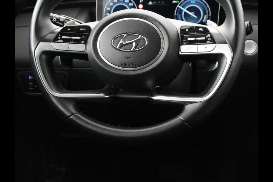 Hyundai Tucson 1.6 T-GDI HEV Comfort | Trekhaak | Stoelverwarming | Adaptive cruise | Carplay | Camera | Navigatie | Keyless | Full LED | 17'' | Parkeerhulp | Climate control | Digital Cockpit