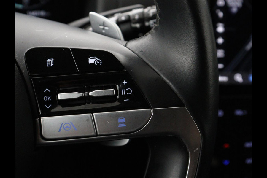 Hyundai Tucson 1.6 T-GDI HEV Comfort | Trekhaak | Stoelverwarming | Adaptive cruise | Carplay | Camera | Navigatie | Keyless | Full LED | 17'' | Parkeerhulp | Climate control | Digital Cockpit
