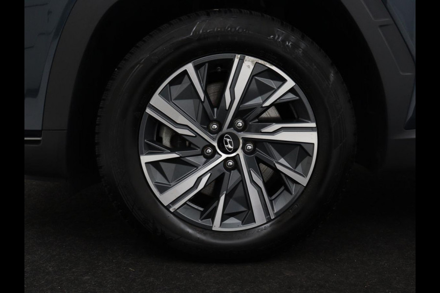 Hyundai Tucson 1.6 T-GDI HEV Comfort | Trekhaak | Stoelverwarming | Adaptive cruise | Carplay | Camera | Navigatie | Keyless | Full LED | 17'' | Parkeerhulp | Climate control | Digital Cockpit
