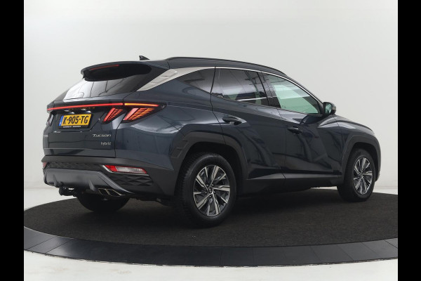 Hyundai Tucson 1.6 T-GDI HEV Comfort | Trekhaak | Stoelverwarming | Adaptive cruise | Carplay | Camera | Navigatie | Keyless | Full LED | 17'' | Parkeerhulp | Climate control | Digital Cockpit