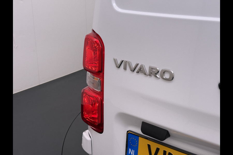 Opel Vivaro 2.0CDTI L2H1 3-Persoons Trekhaak Euro 6 Navi Apple Carplay Android Auto Airco Cruise Control Pdc Edition Regen-Lichtsensor Betonplex Vloer Wandbetimmering Schuifdeur 2.500KG Trekgewicht Origineel Nederlandse Bus